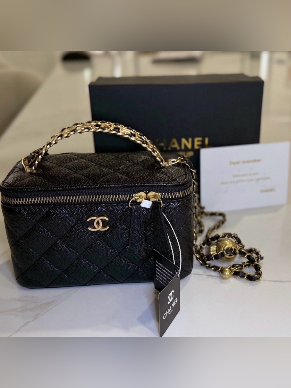 CHANEL Black Quilted Vanity Mini Bag with Gold Chain